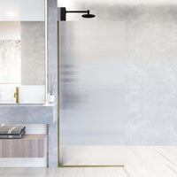 Frameless matte brushed gold shower screen with fluted tempered glass, reversible door