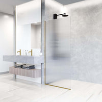 Modern matte gold shower screen with fluted glass and stainless steel hardware