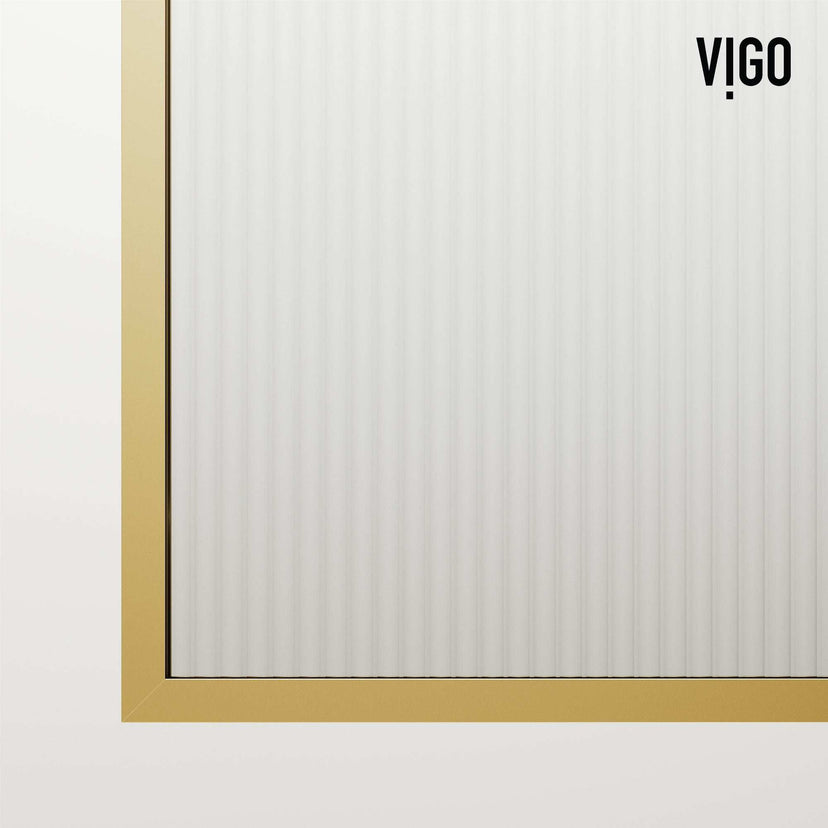 Matte gold frameless shower screen with fluted glass, reversible door, and tempered safety glass
