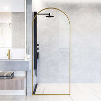 Modern framed shower screen with matte brushed gold finish and clear glass