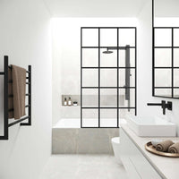 Matte black framed fixed tub screen with fluted tempered glass, 34 x 62 inches