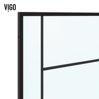 Framed shower screen with matte black grid pattern combining clear and frosted glass panels