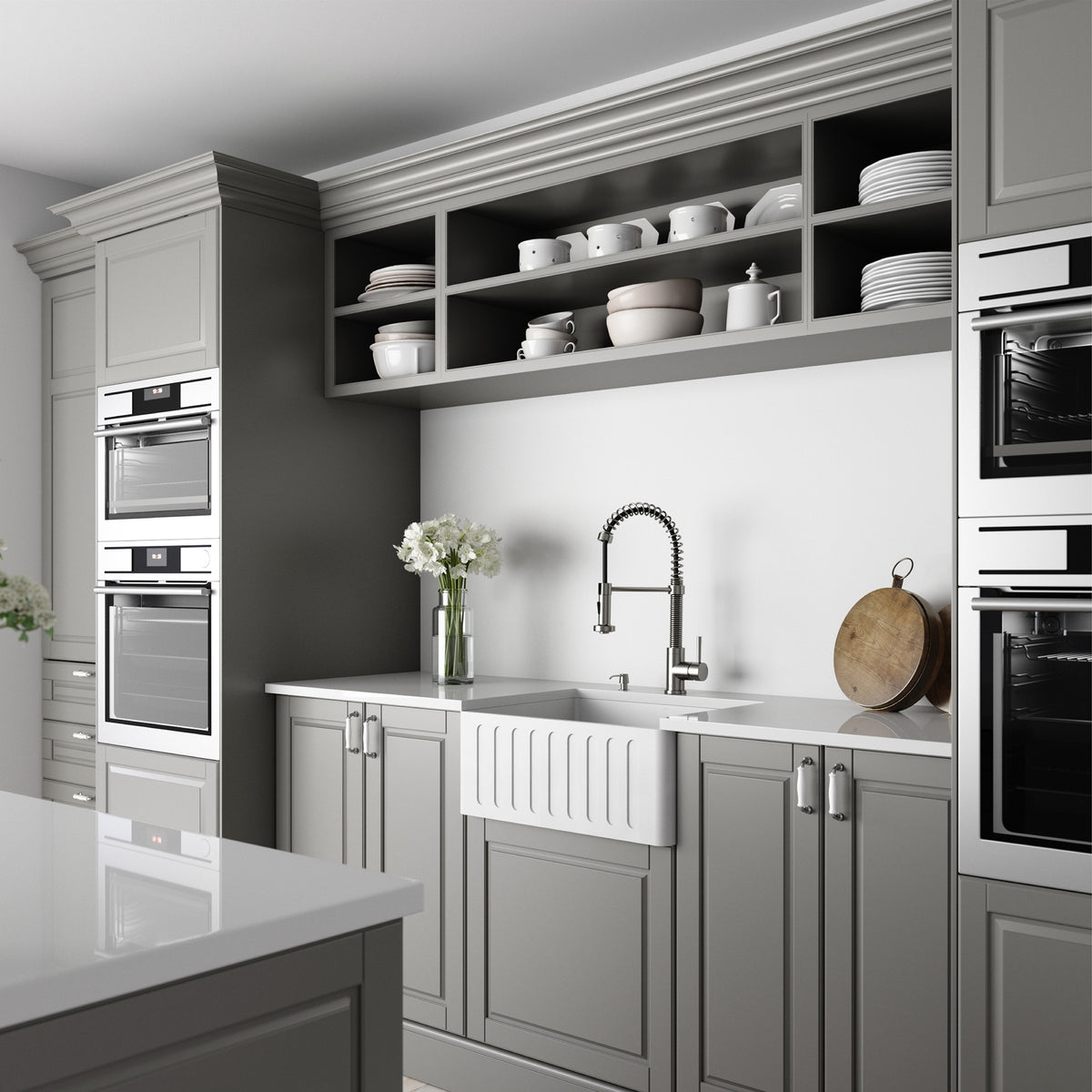 Farmhouse apron-front sink in matte stone material with sound dampening features