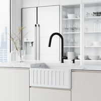Matte white apron-front sink featuring sound dampening and corrosion resistance