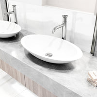 Matte Stone Wisteria Composite Oval Vessel Bathroom Sink in White with Cass Faucet and Pop-Up Drain in Chrome